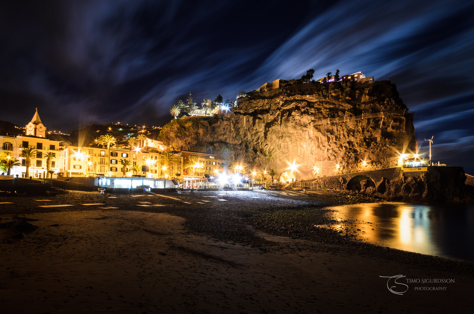 Ponta do Sol, Madeira, Portugal. Beachfront and cliff at night.