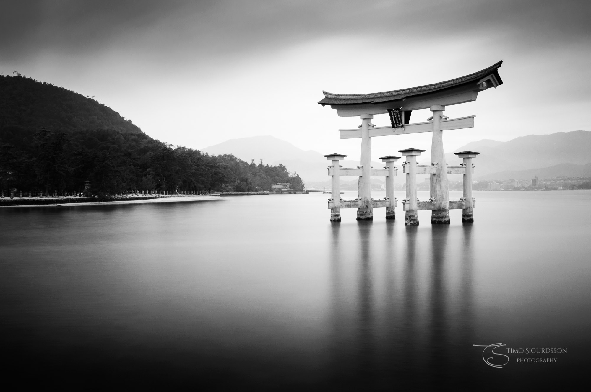 Itsukushima Shrine, Miyajima, Japan. Torii gate floating on the water.